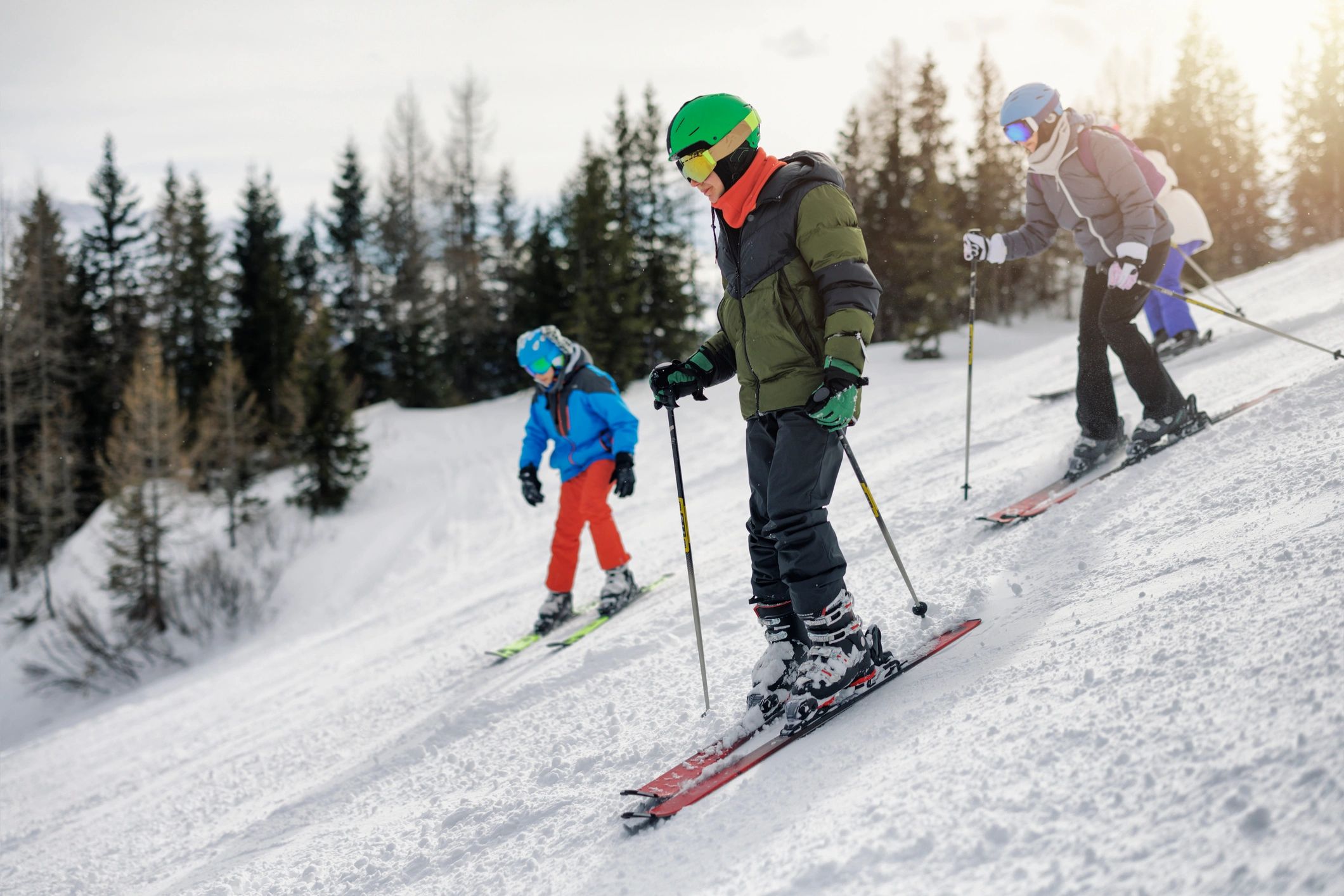 Group ski lesson on a sunny slope