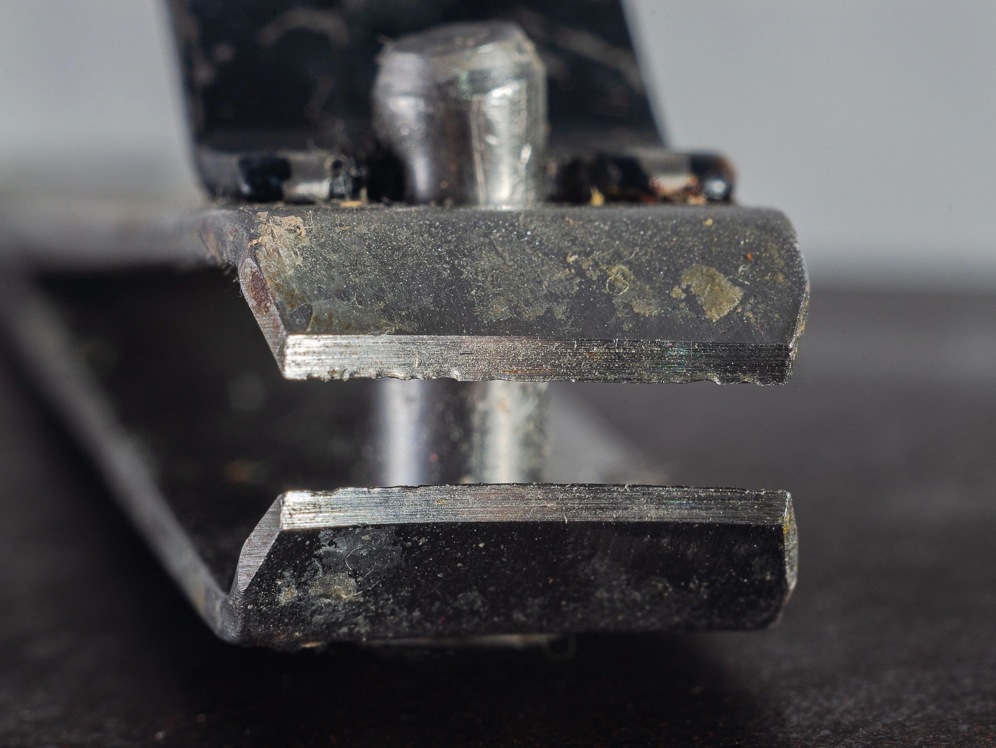 Close-up of a metal tool edge used for sharpening