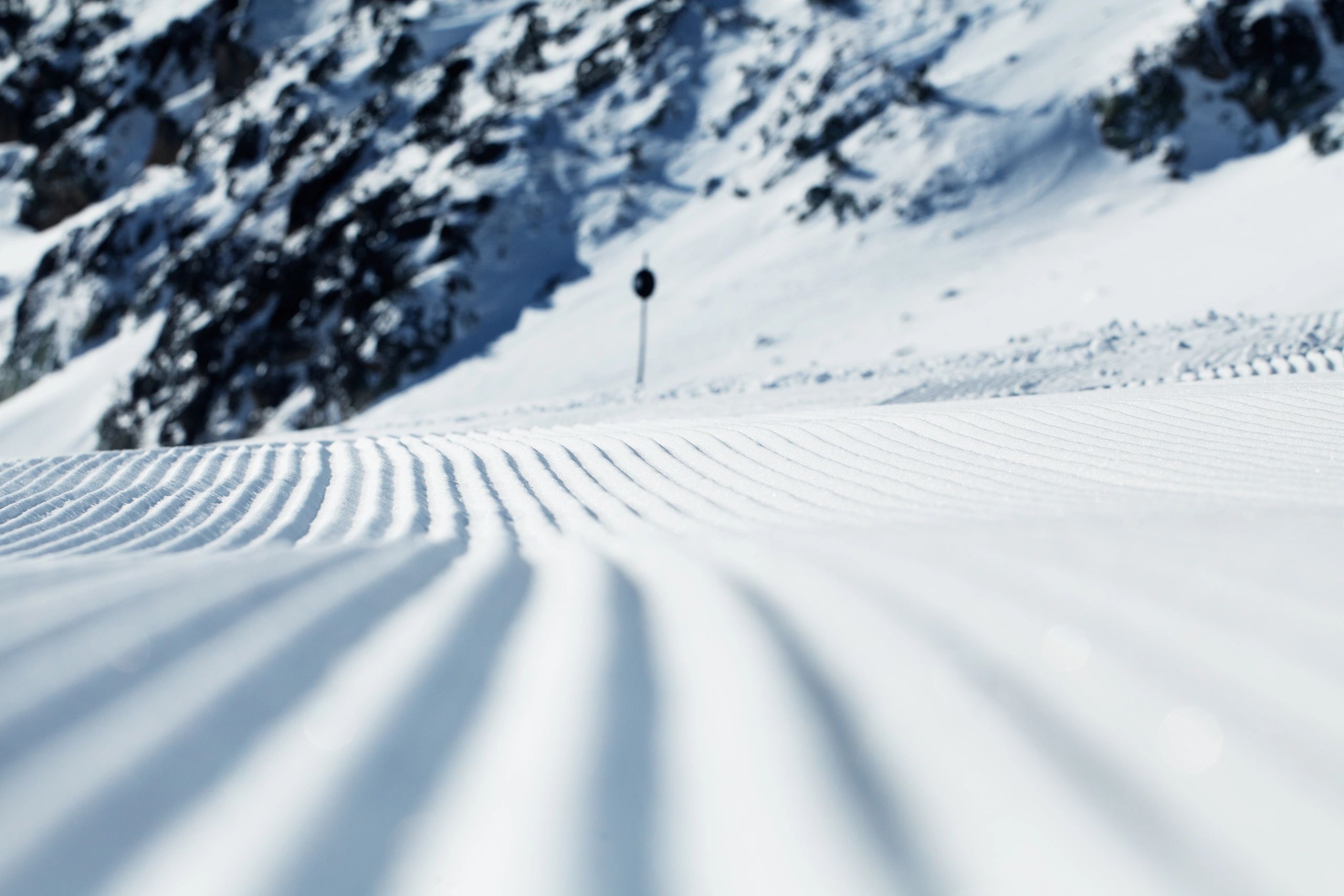 Prepared ski piste on a sunny day